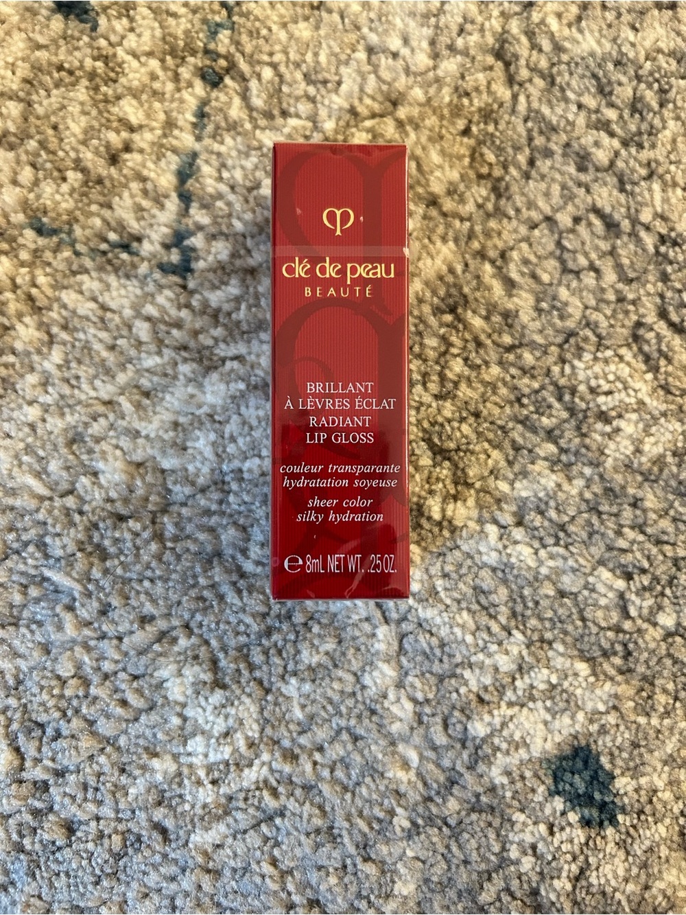 New Sealed Clé de Peau Beauté Radiant Lip Gloss - 103 Legend. Universal Red.